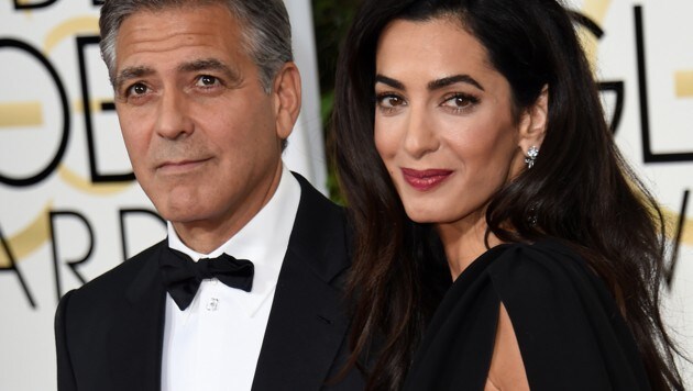 George Clooney und seine Amal (Bild: AFP)