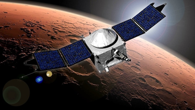 Künstlerische Illustration: Die Marssonde MAVEN im Orbit um den Roten Planeten.