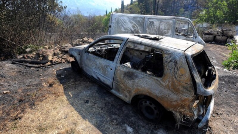 Ausgebrannte Autos nahe der Stadt Split (Bild: AFP)