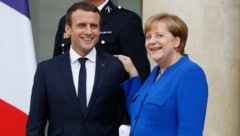 Macron und Merkel nach dem Ministerrat (Bild: AFP)