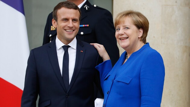Macron und Merkel nach dem Ministerrat (Bild: AFP)