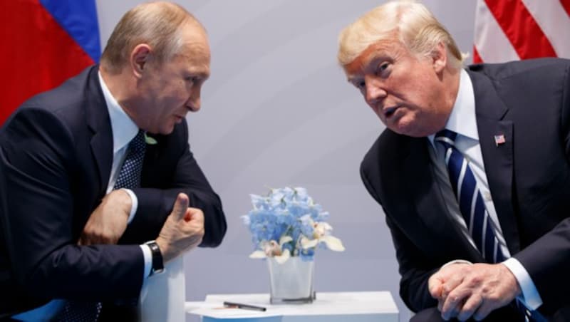 Putin mit Trump am G20-Gipfel (Bild: AP)