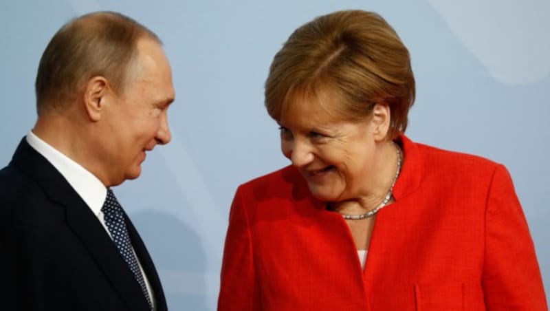 Merkel mit Putin (Bild: AFP)