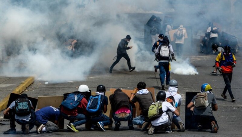 Straßenkämpfe in Caracas (Bild: AFP)