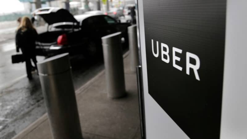 Didi hatte zeitweise einen Börsenwert von 80 Milliarden Dollar - fast so viel wie der US-Rivale Uber. (Bild: AP)