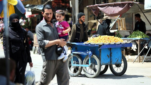 Straßenszene aus Damaskus vom 23.5.2017 - seit 2011 herrscht in Syrien Bürgerkrieg. (Bild: AFP)