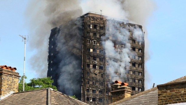 Der Hochhausbrand in London wirft viele Fragen auf. (Bild: AP)