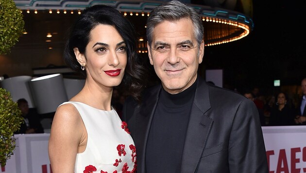Amal und George Clooney (Bild: AP)