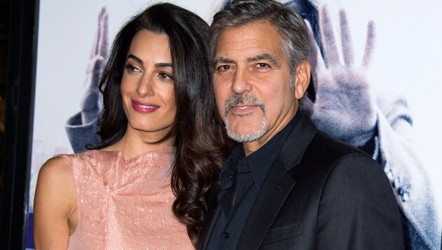 Amal und Georg Clooney (Bild: AP)