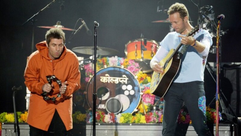 Liam Gallagher (Oasis, li.) und Christ Martin (Coldplay) (Bild: AP)