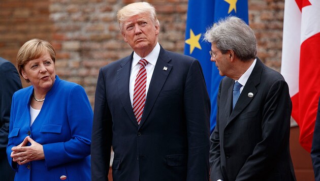 Viele Freunde hat Trump (hier neben Merkel und Gentiloni) beim G7-Gipfel nicht gewonnen. (Bild: AP)