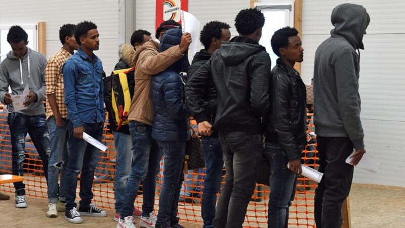 Flüchtlinge in Deutschland (Bild: AFP)