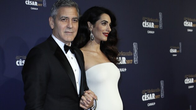 George Clooney und seine Amal (Bild: AFP)