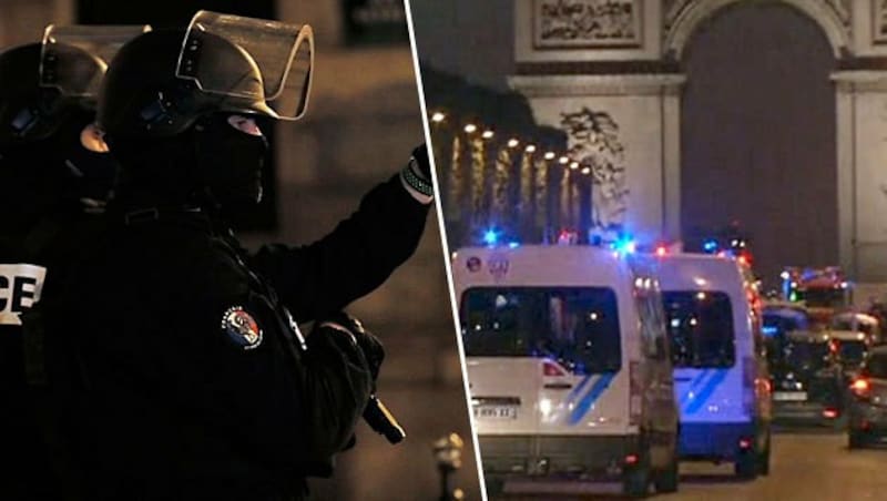 Schwer bewaffnete Polizisten, die abgeriegelten Champs-Elysees und Blaulicht, wohin das Auge reicht (Bild: AFP)