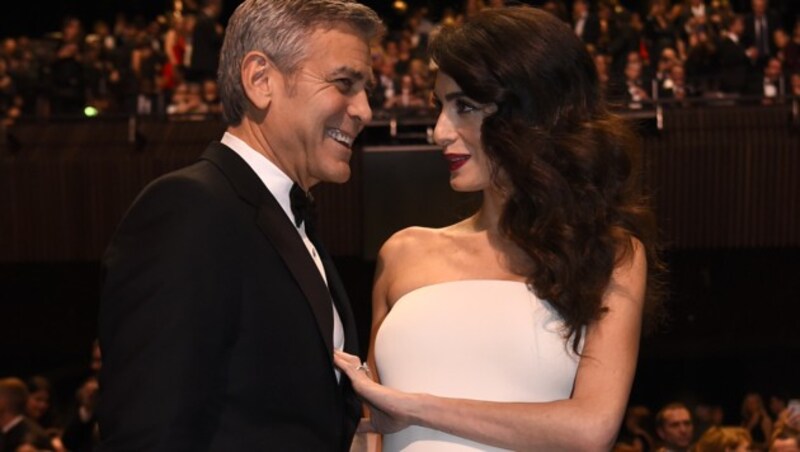 George Clooney und seine Amal (Bild: AFP)