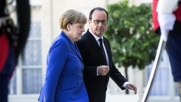Die deutsche Bundeskanzlerin Angela Merkel mit Frankreichs Präsident Francois Hollande (Bild: APA/EPA/ETIENNE LAURENT)