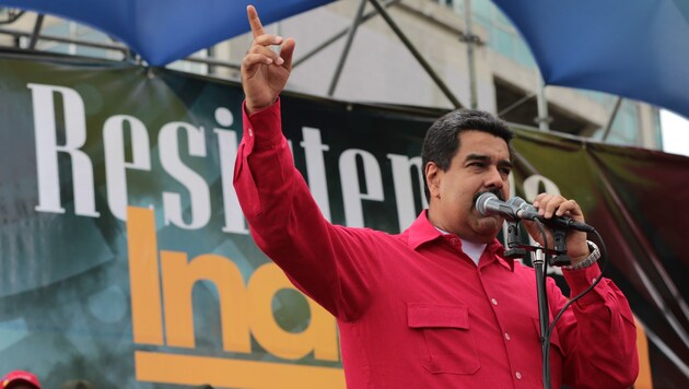 Präsident Maduro klammert sich mit allen Mitteln an die Macht. (Bild: APA/AFP/Venezuelan Presidency)