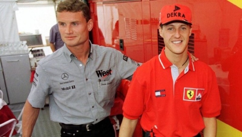 David Coulthard (li.) und Michael Schumacher im Jahr 1998 (Bild: dpa)