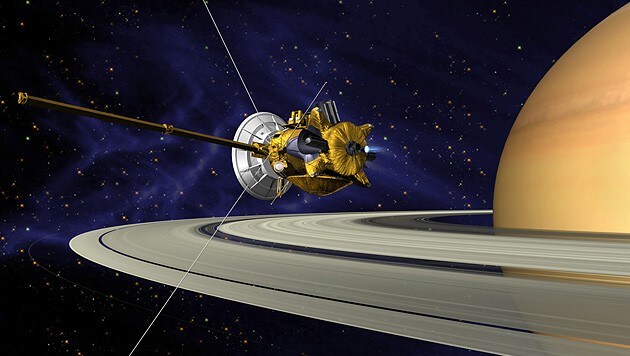 Illustration: Die Raumsonde "Cassini" vor dem Ringplaneten Saturn (Bild: NASA/JPL)