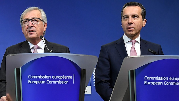 Bundeskanzler Kern drängt EU-Kommissionschef Juncker zu einem besseren Schutz des Arbeitsmarktes. (Bild: AFP)