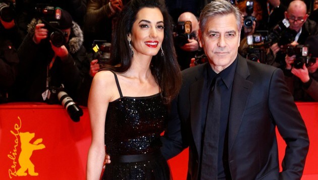 George Clooney mit seiner Amal (Bild: AP)