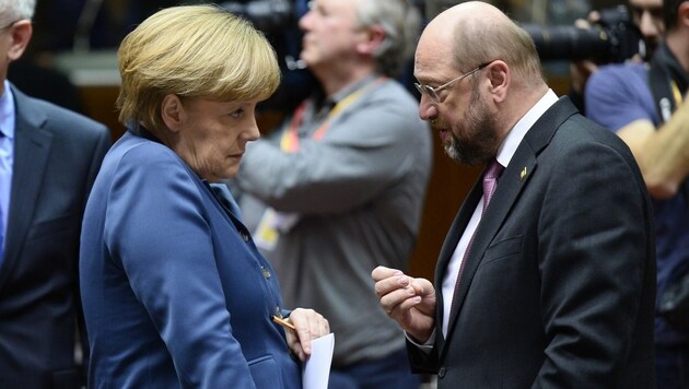 Kanzlerin Angela Merkel, SPD-Chef Martin Schulz (Bild: LIONEL BONAVENTURE/AFP/picturedesk.com)