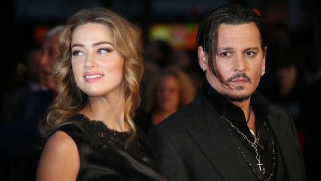 Amber Heard und Johnny Depp (Bild: Joel Ryan/Invision/AP)