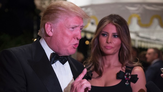 Trump (mit Gattin Melania) deutete eine Enthüllung zu den angeblichen russischen Hackerangriffen an. (Bild: APA/AFP/DON EMMERT)