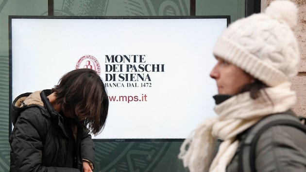 Wegen der Verstaatlichung der Monte dei Paschi müssen sich die Steuerzahler warm anziehen. (Bild: APA/AFP/TIZIANA FABI)
