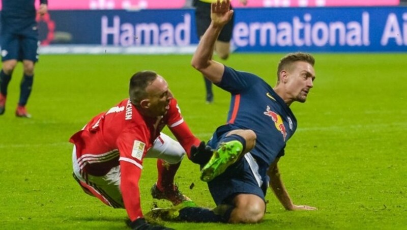 Stefan Ilsanker gegen Franck Ribery (Bild: AFP)