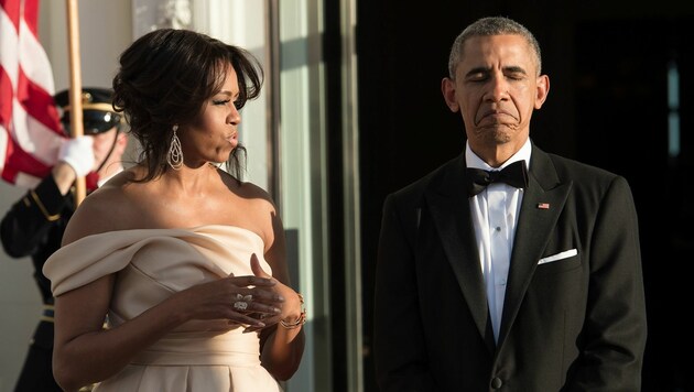 Michelle und Barack Obama (Bild: APA/AFP/NICHOLAS KAMM)