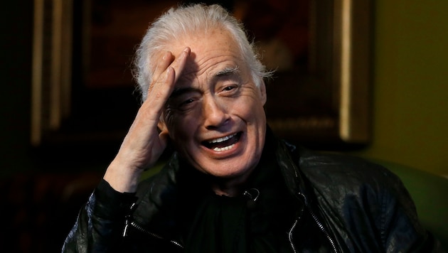 Ein Rockgott an der Sechs- oder Mehrsaitigen: Led Zeppelins Jimmy Page (Bild: AP)