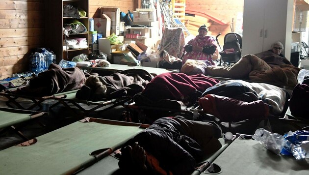 Eine Notschlafstelle in Visso (Bild: APA/AFP/TIZIANA FABI)