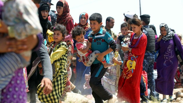 Massenflucht aus der irakischen Stadt Falludscha (Bild: AFP)