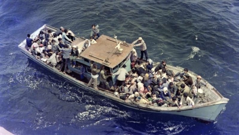 Ein Foto vom 8. Juli 1979 zeigt vietnamesische Flüchtlinge im Südchinesischen Meer. (Bild: AFP)