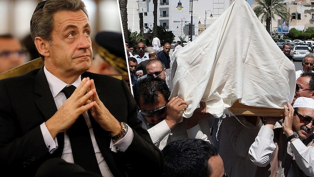 Nach dem Tod eines Gadafi-Ministers (Bild rechts zeigt die Beerdigung) führt eine Spur zu Sarkozy. (Bild: APA/AFP/THOMAS SAMSON, AFP)