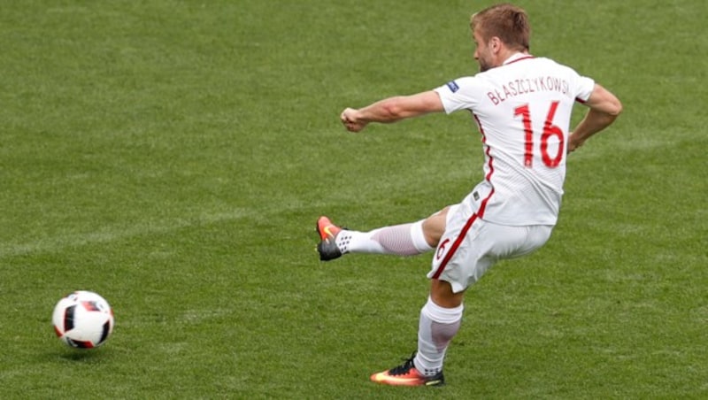 Jakub Blaszczykowski trifft gekonnt zum 1:0 für Polen (Bild: AP)