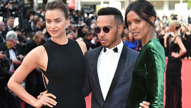 Lewis Hamilton beim Film-Festival Cannes mit den Models Irina Shayk (li.) und Liya Kebede (Bild: AFP or licensors)