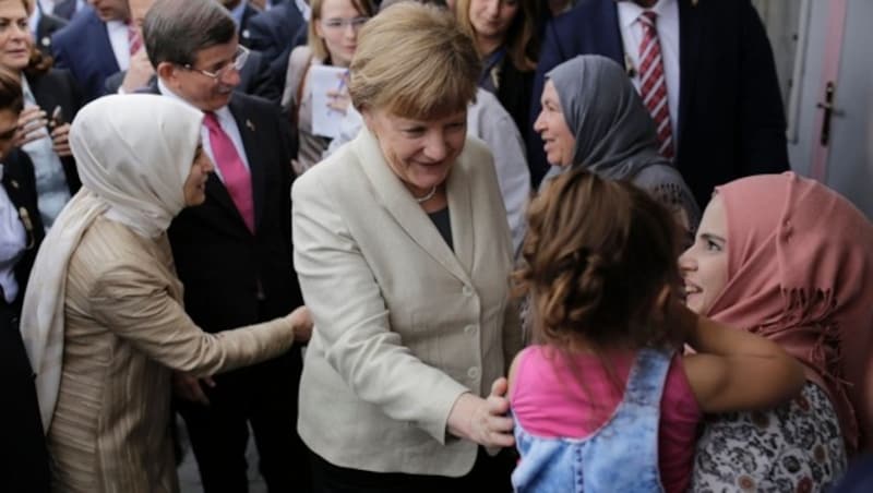 Angela Merkel im Flüchtlingslager Nizip (Bild: APA/AFP/STR)