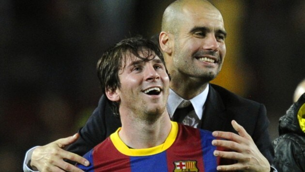 Pep Guardiola (rechts) mit Lionel Messi (Bild: JAVIER SORIANO / AFP / picturedesk.com)