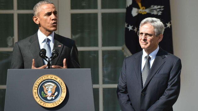 Obama (li.) und Bundesrichter Merrick Garland (Bild: AFP)