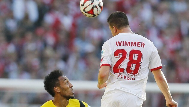 Kevin Wimmer (bei seinem Ex-Klub Köln) im Zweikampf mit Dortmunds Pierre-Emerick Aubameyang. (Bild: AP)