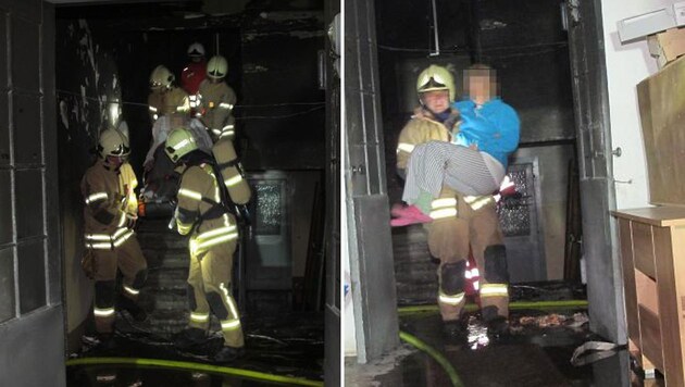 Die Helfer bei der Rettung der Opfer - eines von ihnen musste aus dem Gebäude getragen werden (Bild: Berufsfeuerwehr Graz)