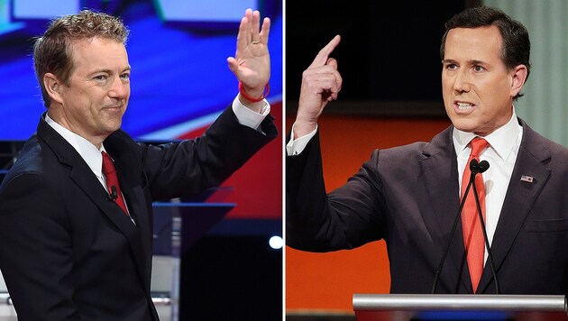 Paul (li.) und Santorum (Bild: APA/AFP/Robyn Beck, Associated Press)