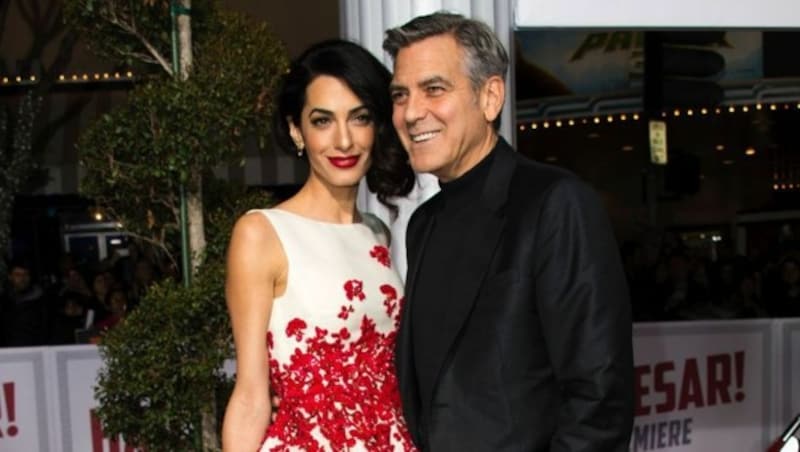 Amal und George Clooney (Bild: APA/AFP/VALERIE MACON)