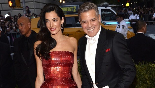 Amal und George Clooney (Bild: APA/EPA/JUSTIN LANE)