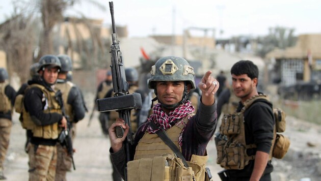 Mitglieder einer irakischen Antiterror-Spezialeinheit nach dem Sieg in Ramadi (Bild: APA/AFP/AHMAD AL-RUBAYE)