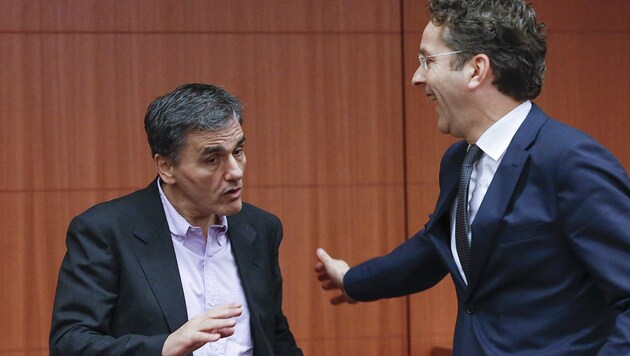 Griechenlands Finanzminister Euklid Tsakalotos und Eurogruppen-Chef Dijsselbloem (Bild: APA/EPA/Olivier Hoslet)