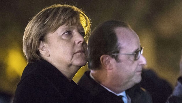 Kanzlerin Merkel und Präsident Hollande wollen nun verstärkt gegen den IS vorgehen. (Bild: APA/AFP/POOL/ETIENNE LAURENT)
