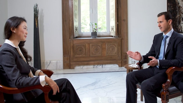 Syriens Machthaber Assad gab dem chinesischen Sender Phoenix ein Interview. (Bild: APA/AFP/HO)